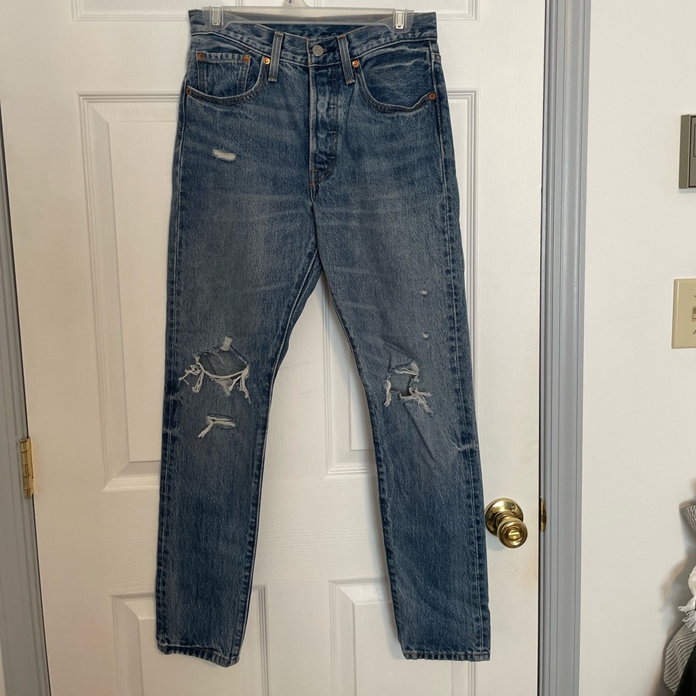 Levi’s light washed jeans with rips 501s